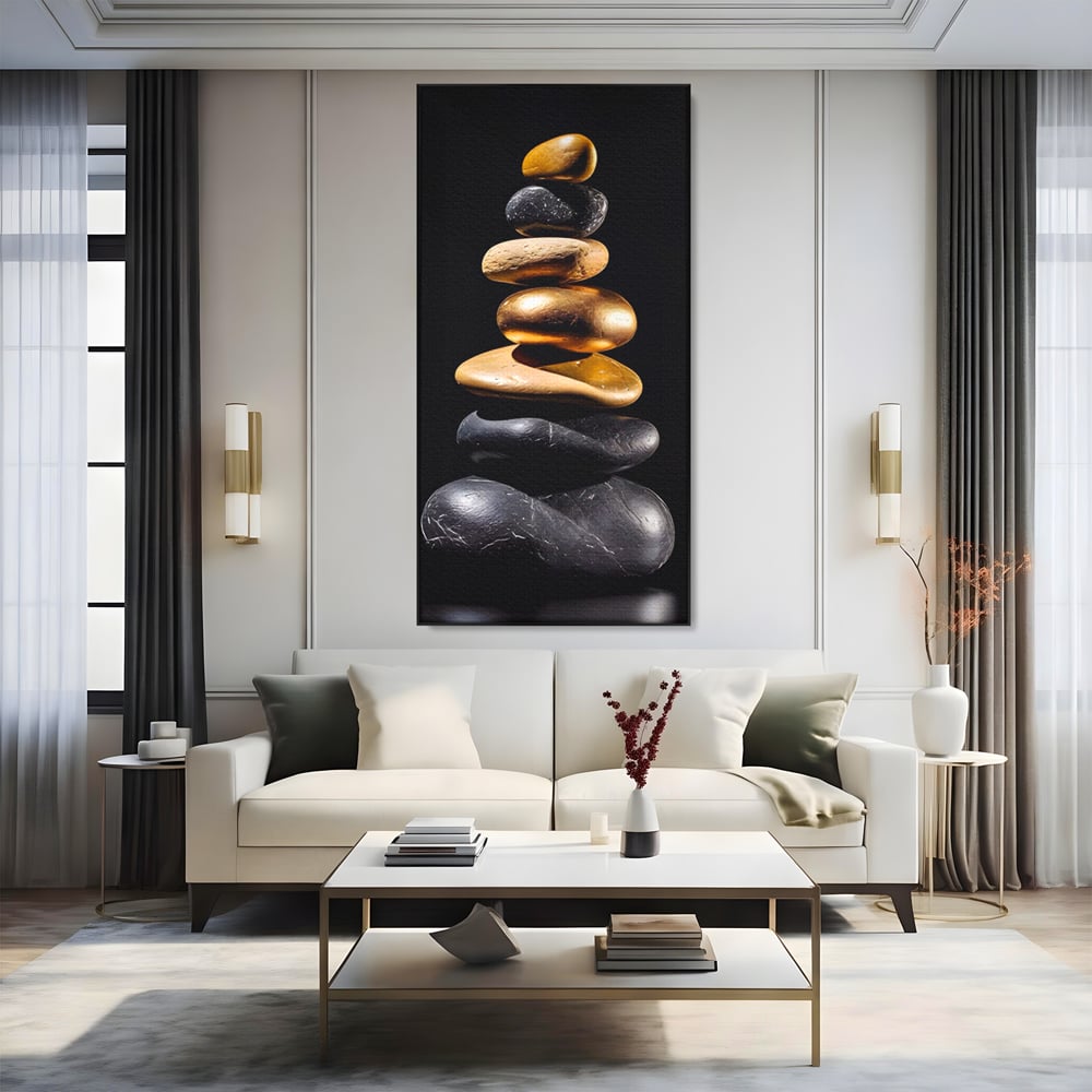 Tablou canvas cu turn vertical din pietre suprapuse, in rama de aluminiu negru, pe perete intr-un living